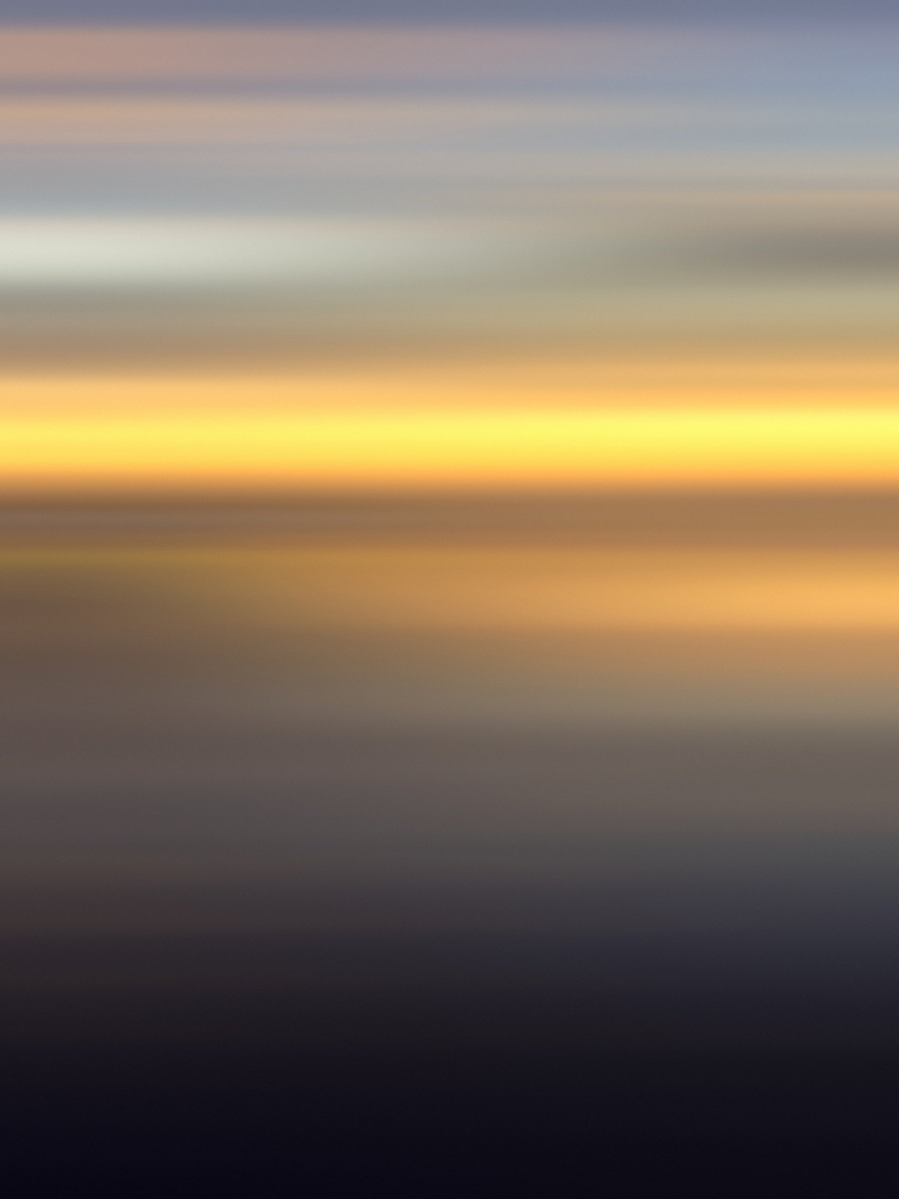 Vertical abstract of soft bands of gold, slate and lavender.