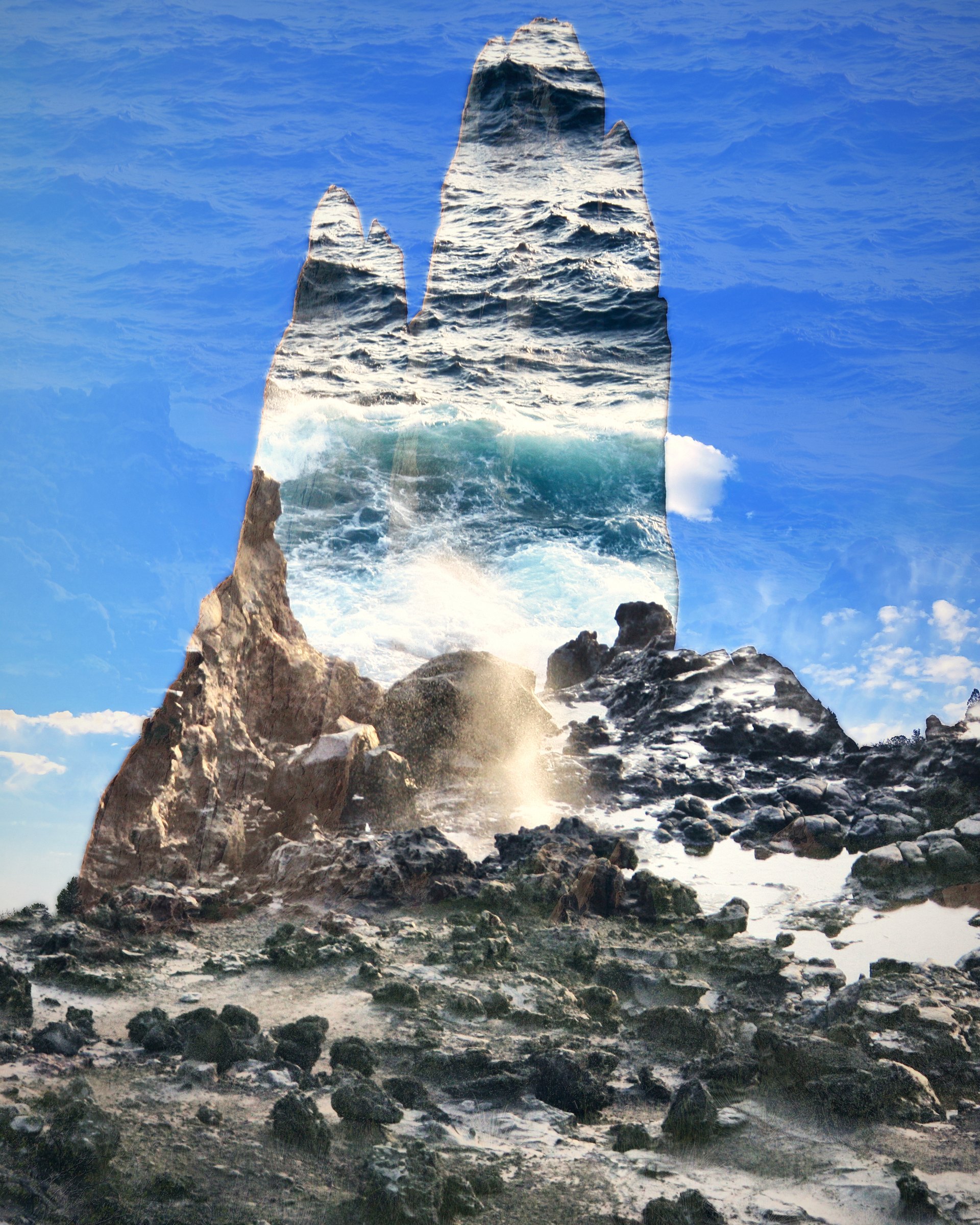 Rock spires filled with crashing waves above rugged stone.