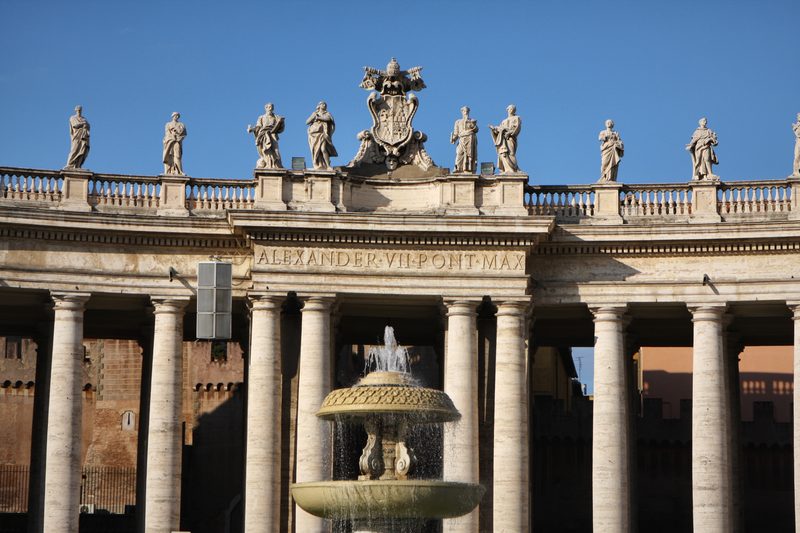A fountain in front of the colonnade in St Peter's Square.
